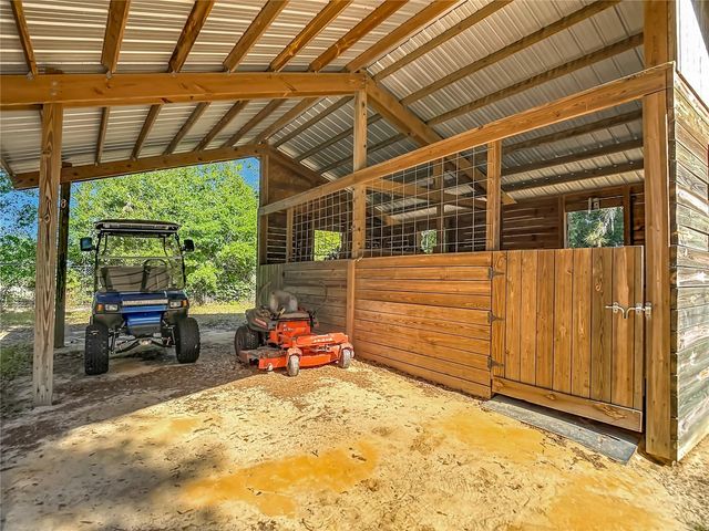 7104 QUAIL HOLLOW BOULEVARD, Wesley Chapel, FL 33544