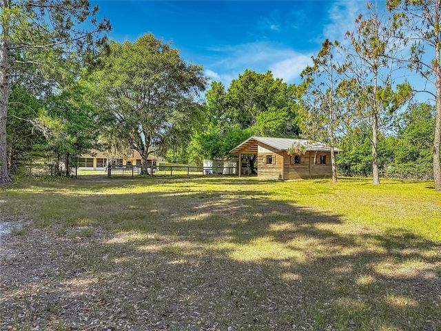 7104 QUAIL HOLLOW BOULEVARD, Wesley Chapel, FL 33544