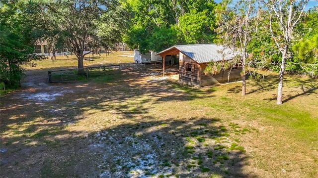 7104 QUAIL HOLLOW BOULEVARD, Wesley Chapel, FL 33544