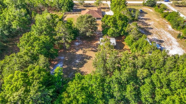 7104 QUAIL HOLLOW BOULEVARD, Wesley Chapel, FL 33544