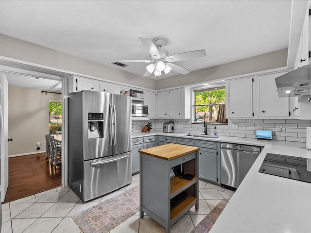 9203 Taidswood Drive, Spring, TX 77379