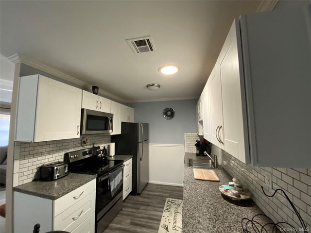 274 Berwick Court A, Ridge, NY 11961