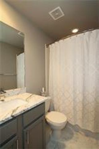 63 Woodlily Place, The Woodlands, TX 77382
