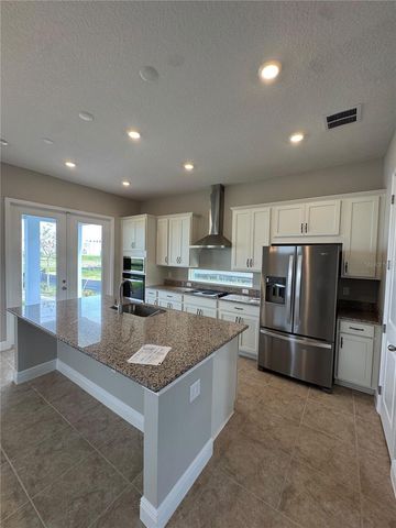 9841 PEEBLES STREET, Orlando, FL 32827