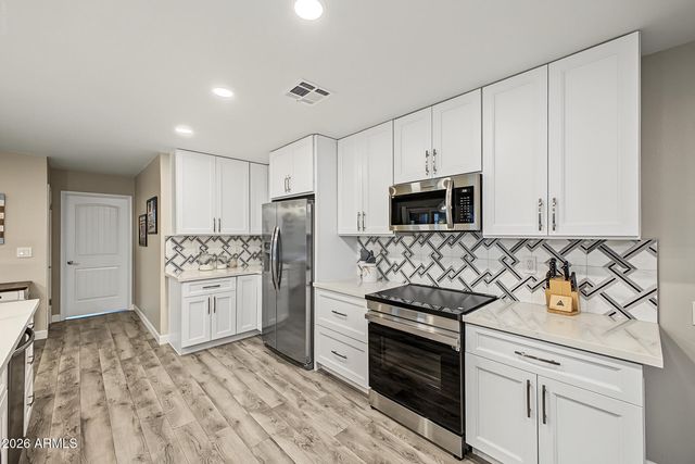 12548 W PINETOP Drive, Sun City West, AZ 85375