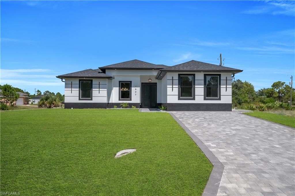 1907 W 14th ST, LEHIGH ACRES, FL 33972 — exterior