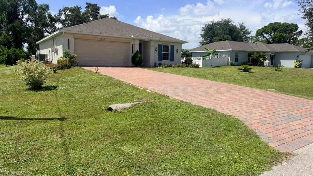 1004 NE 36th TER, CAPE CORAL, FL 33909 — exterior