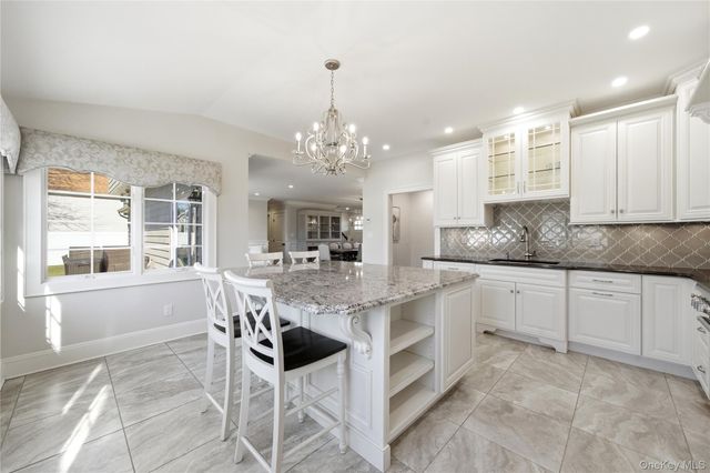 102 Peconic Drive S, Massapequa, NY 11758