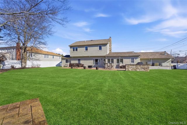 102 Peconic Drive S, Massapequa, NY 11758