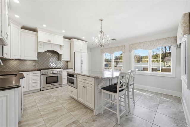 102 Peconic Drive S, Massapequa, NY 11758