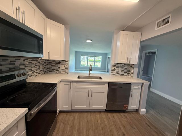 7355 Woodmont Terrace 107, Tamarac, FL 33321