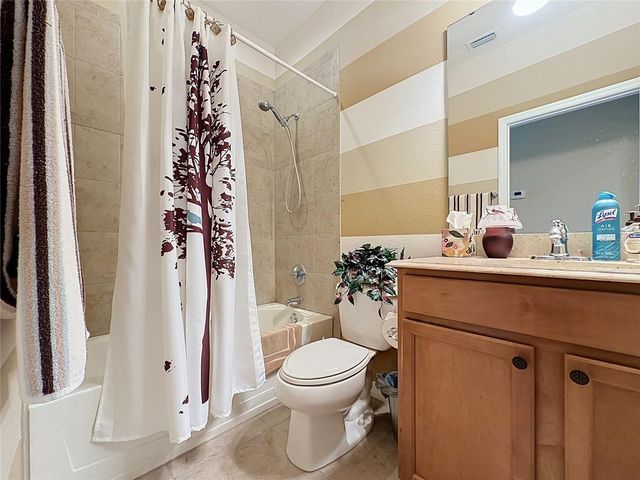 107 FALLING ACORN AVENUE, Groveland, FL 34736