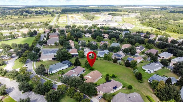 107 FALLING ACORN AVENUE, Groveland, FL 34736