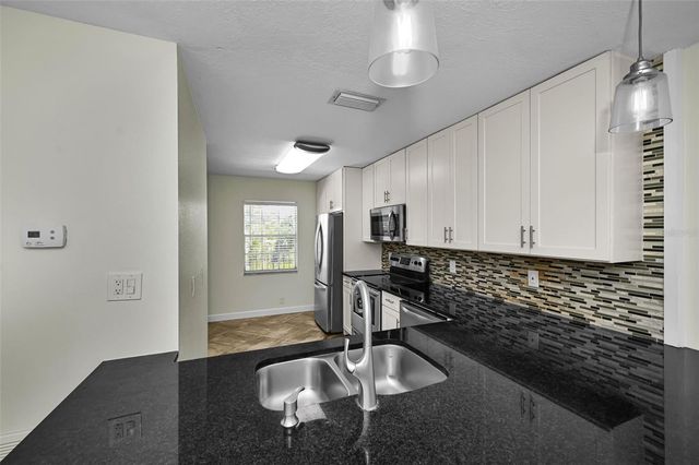 8765 BARDMOOR BOULEVARD 306, Seminole, FL 33777