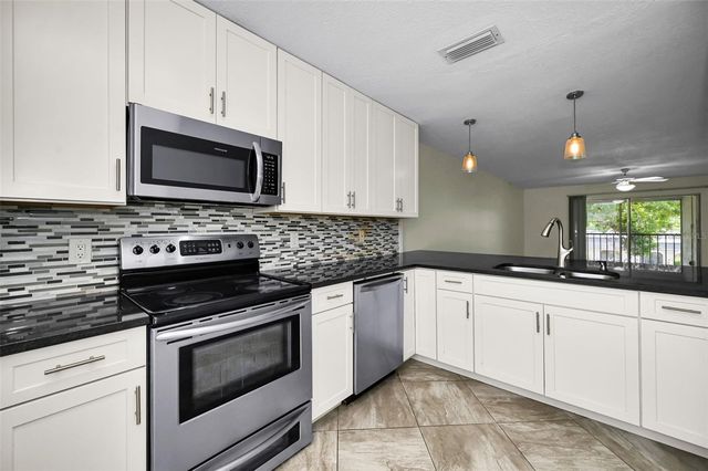 8765 BARDMOOR BOULEVARD 306, Seminole, FL 33777