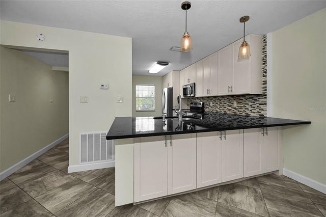 8765 BARDMOOR BOULEVARD 306, Seminole, FL 33777