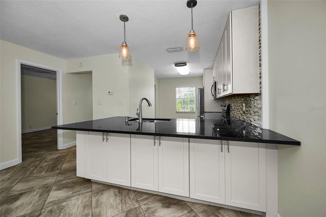 8765 BARDMOOR BOULEVARD 306, Seminole, FL 33777