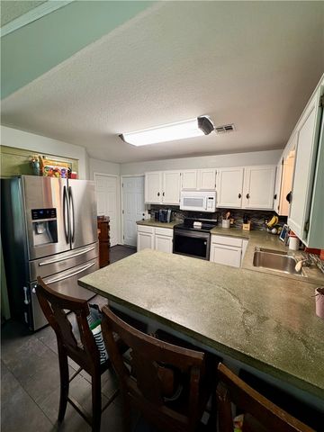 1519 Lancelot Street, Lowell, AR 72745