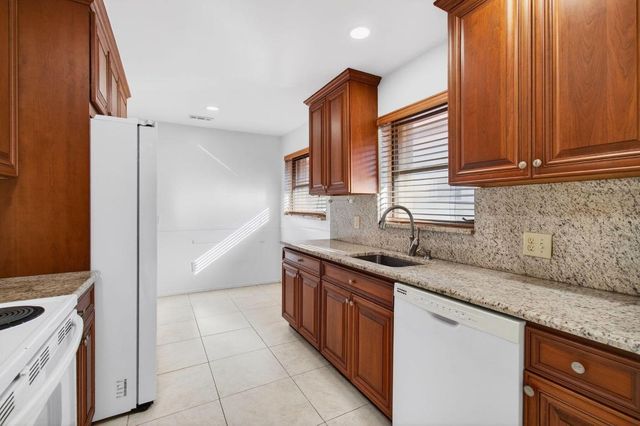 6100 Olivewood Circle, Greenacres, FL 33463