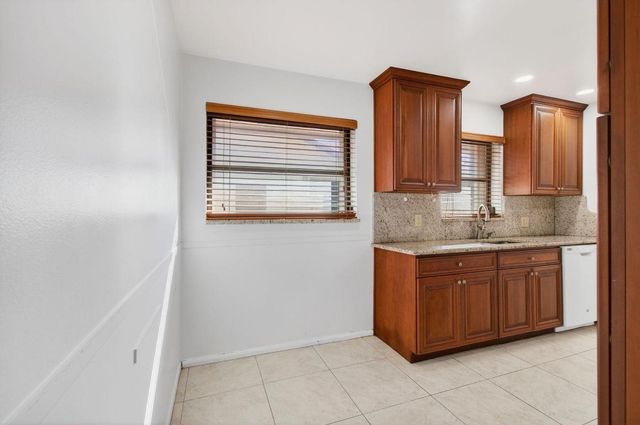 6100 Olivewood Circle, Greenacres, FL 33463