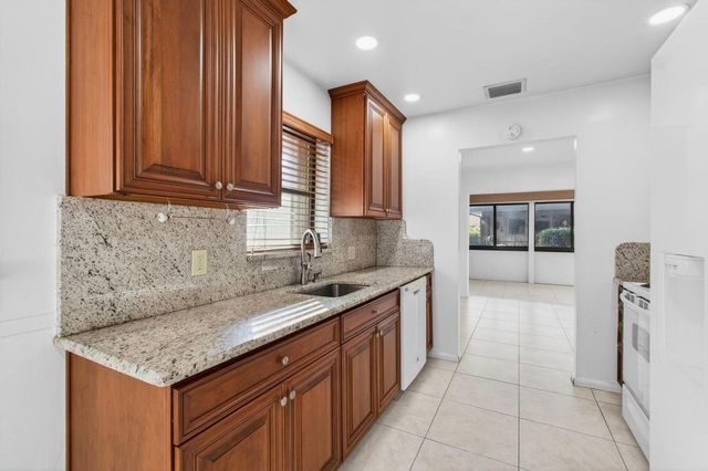 6100 Olivewood Circle, Greenacres, FL 33463