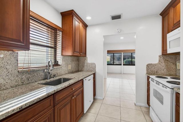 6100 Olivewood Circle, Greenacres, FL 33463