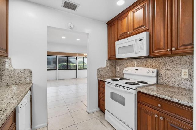 6100 Olivewood Circle, Greenacres, FL 33463