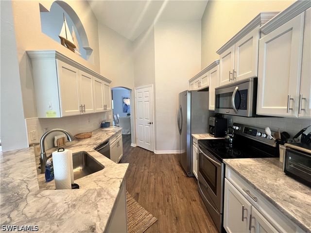 25240 PELICAN CREEK CIR 202, Bonita Springs, FL 34134