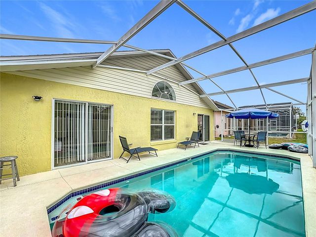 458 HOLLINGHEAD LOOP, Davenport, FL 33896