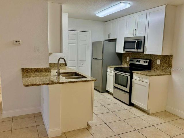 7630 PISSARRO DRIVE 16105, Orlando, FL 32819