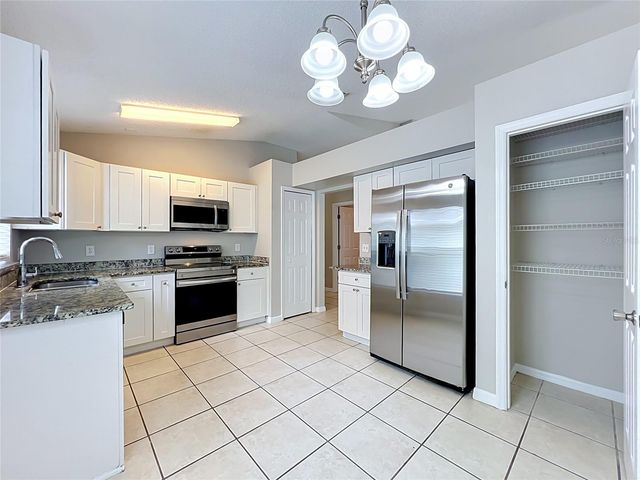 1005 WINDING WATER WAY, Clermont, FL 34714