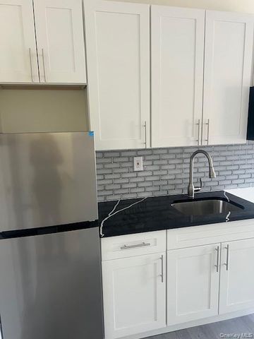 9414 Corona Avenue, Elmhurst, NY 11373