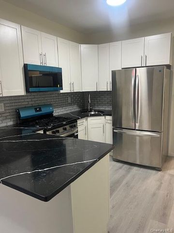 9414 Corona Avenue, Elmhurst, NY 11373
