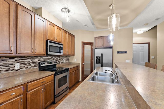 12449 Flanders Court NE G, Blaine, MN 55449