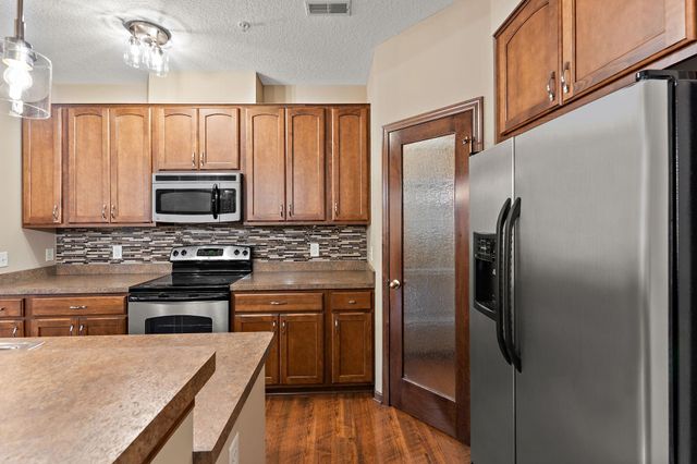 12449 Flanders Court NE G, Blaine, MN 55449