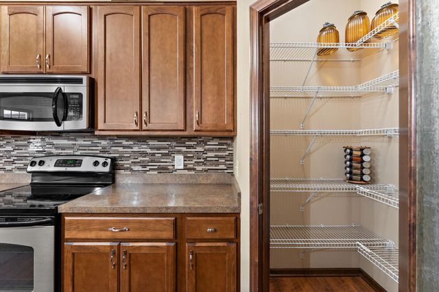 12449 Flanders Court NE G, Blaine, MN 55449