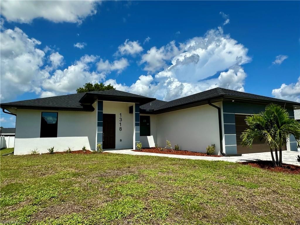 1318 NE 4th PL, CAPE CORAL, FL 33909 — photo 2