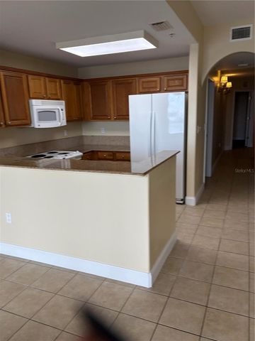 13427 BLUE HERON BEACH DRIVE 406, Orlando, FL 32821