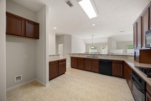 30607 Hackinson Drive, Spring, TX 77386