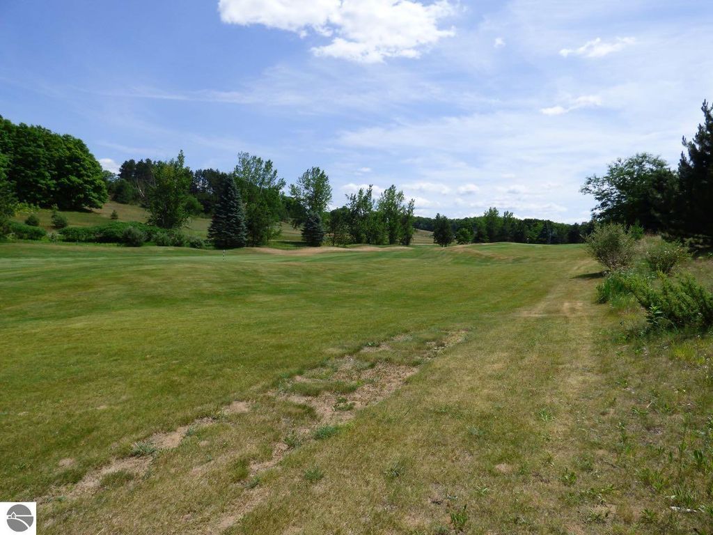 Image 11 of property listing at Unit 37 Golf Meadows Drive, Bellaire, MI 49615