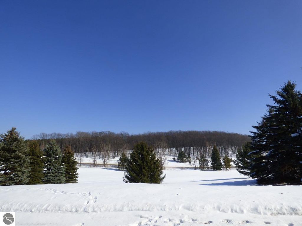 Image 23 of property listing at Unit 37 Golf Meadows Drive, Bellaire, MI 49615