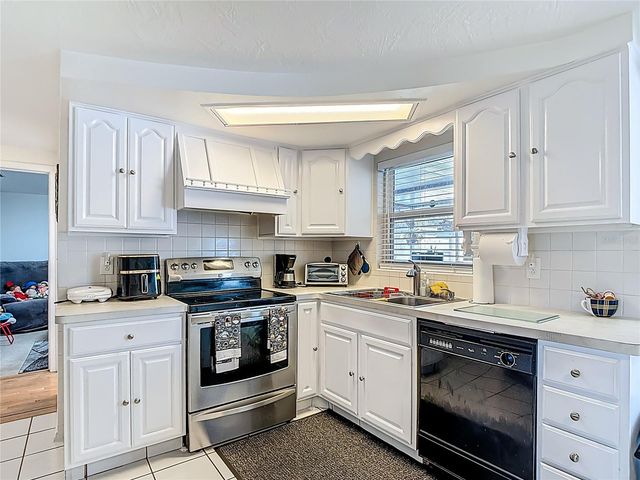 4612 FLORA AVENUE, Holiday, FL 34690