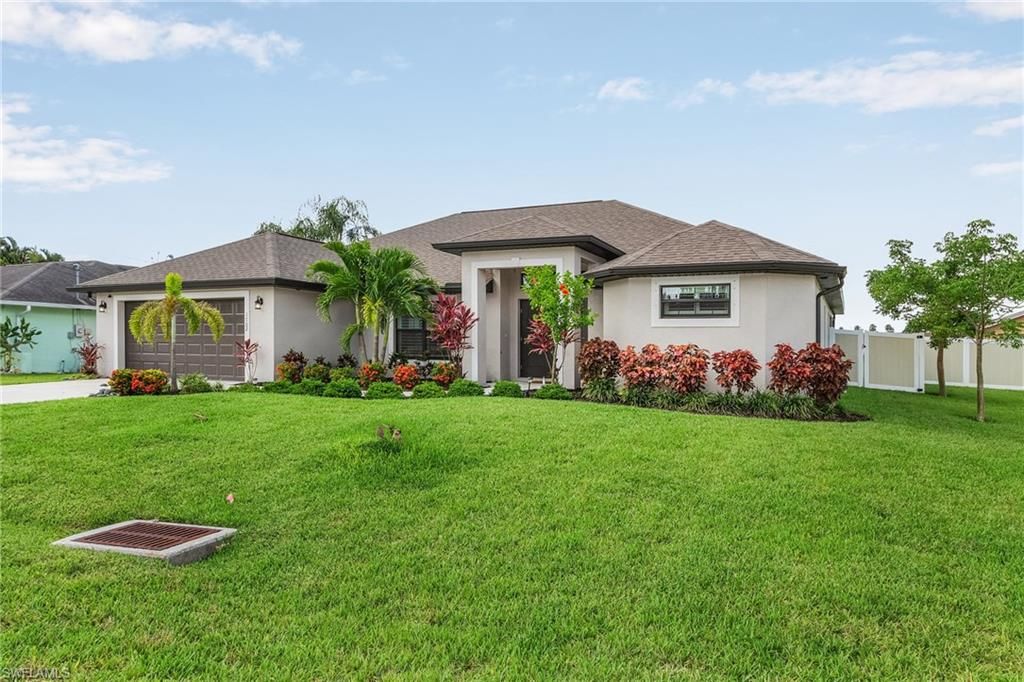 1702 SE 1st TER, CAPE CORAL, FL 33990 — exterior