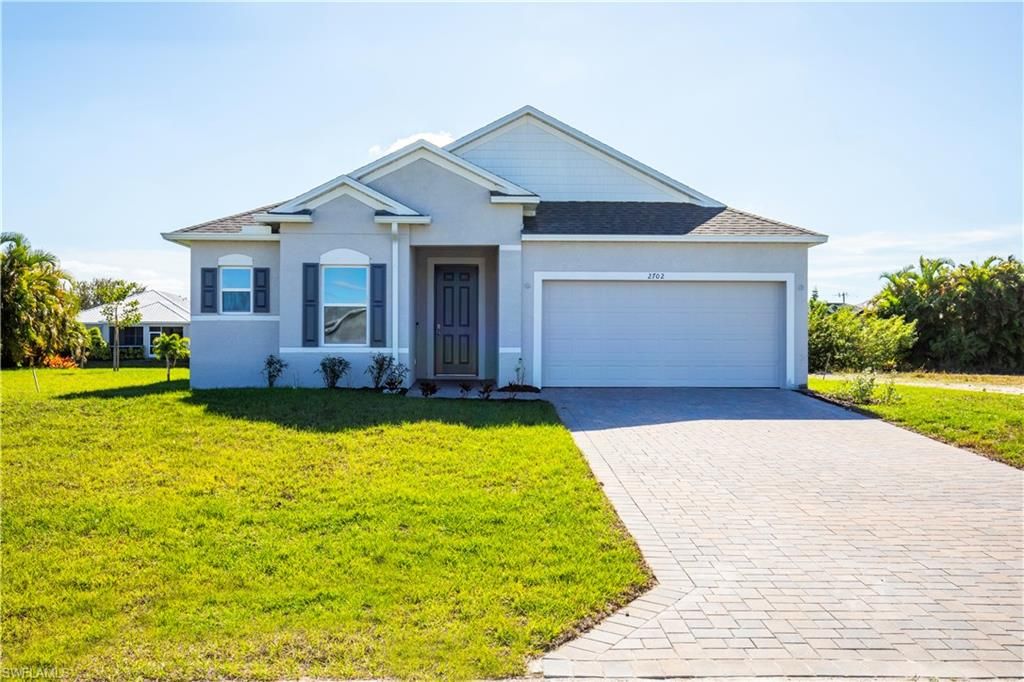 2702 NW 1st TER, CAPE CORAL, FL 33993 — exterior