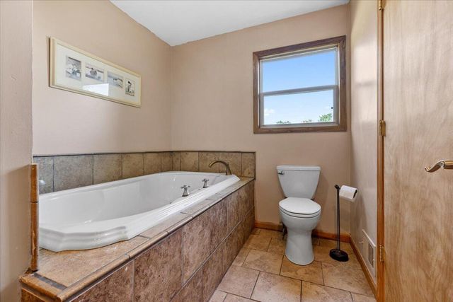 11265 W Coon Lake Road, Webberville, MI 48892