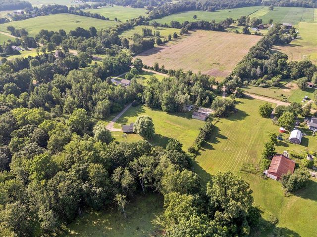 11265 W Coon Lake Road, Webberville, MI 48892