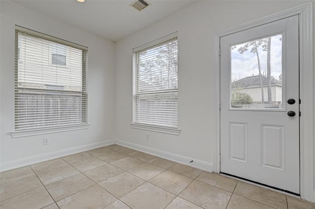 71 N Rocky Point Circle, The Woodlands, TX 77389