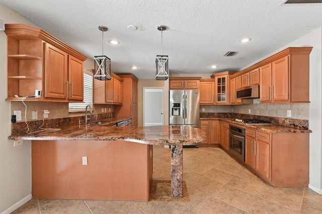 1163 Peninsula Way, Greenacres, FL 33413