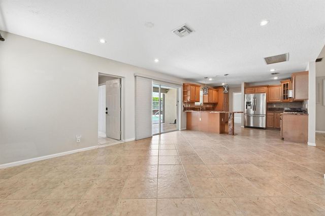 1163 Peninsula Way, Greenacres, FL 33413