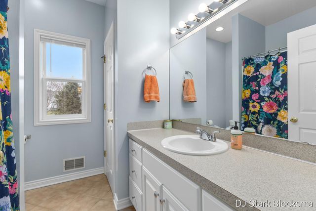 69 Rogue River View Drive NE, Rockford, MI 49341